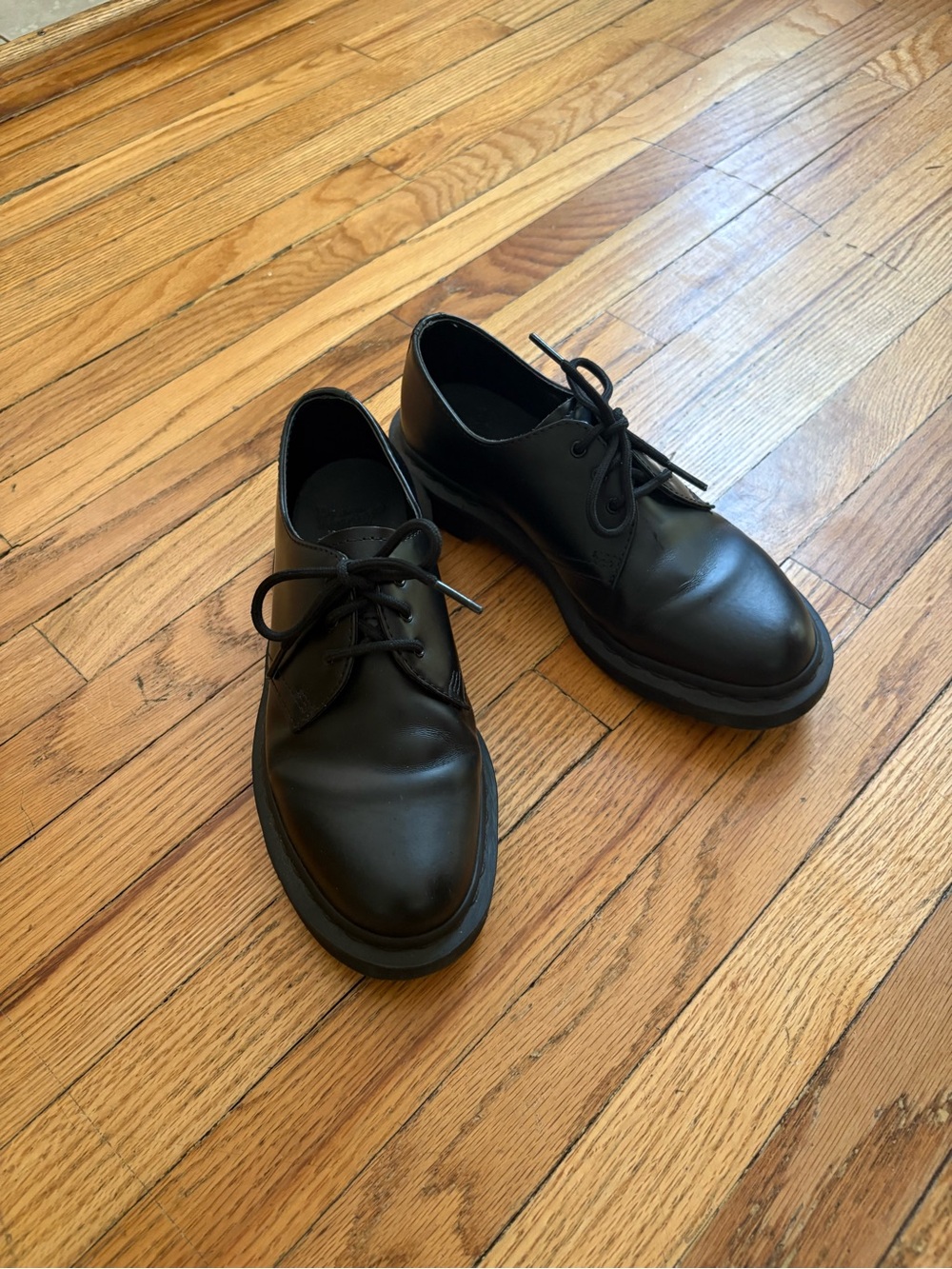 Dr. Martens Women's Black Leather Lace-Up Flats